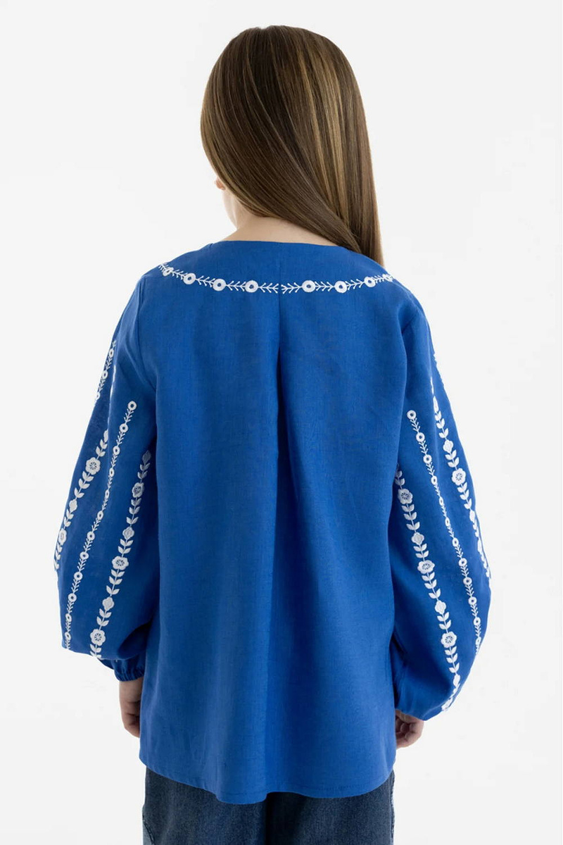 Embroidered blouse for a girl made of blue linen "Yarynka"